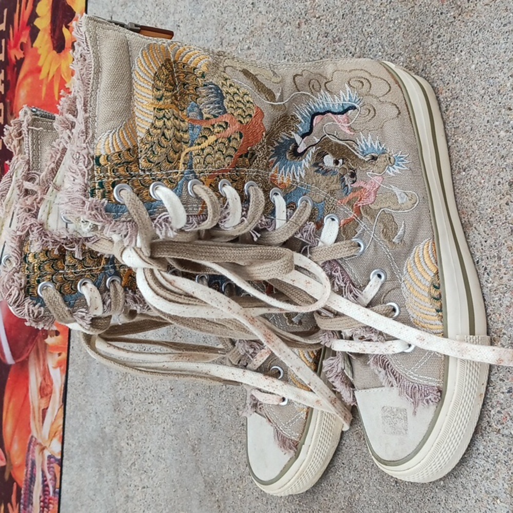 Biya Jonny Was Embroidered high top tennis shoes.  Womens size 7